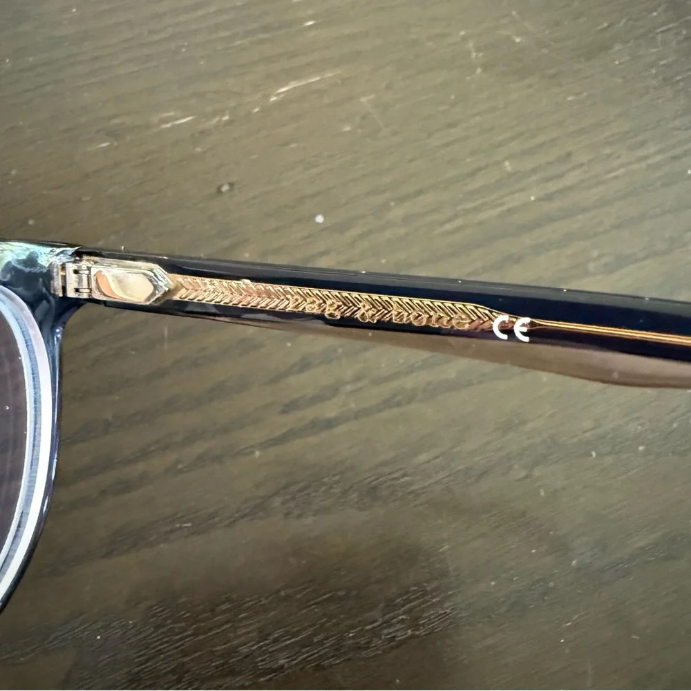 Rag & Bone eyeglasses with a black frame RNB3029 YRQ 140